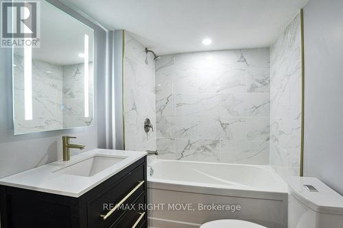 4pc. bathroom in basement; LED back-lit mirror. - 299 Mary Street, Orillia, ON - Indoor Photo Showing Bathroom