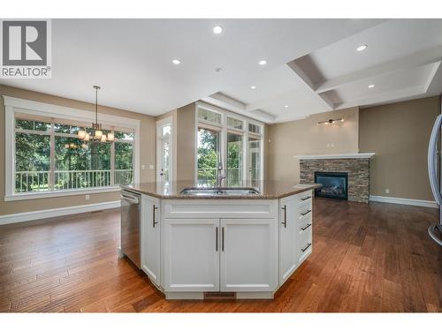 2532 Tuscany Drive, West Kelowna, BC - Indoor Photo Showing Kitchen With Fireplace