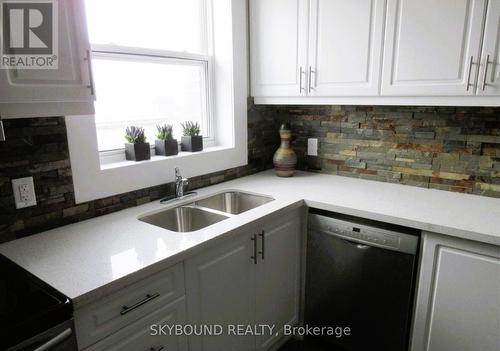 835 King Street E, Hamilton, ON - Indoor Photo Showing Kitchen With Double Sink