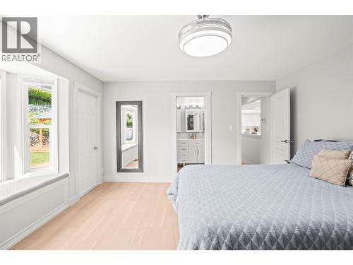 Primary bedroom - 8990 College Drive, Coldstream, BC - Indoor Photo Showing Bedroom