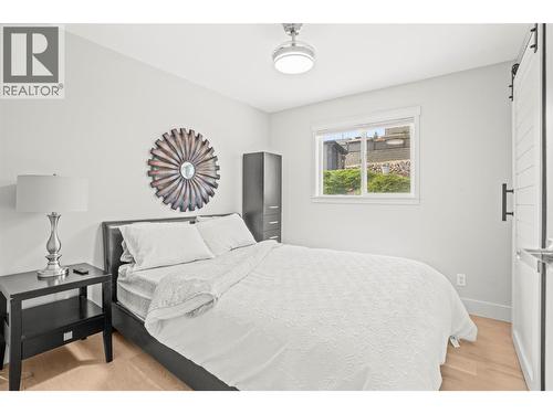 Main level-bedroom #2 - 8990 College Drive, Coldstream, BC - Indoor Photo Showing Bedroom