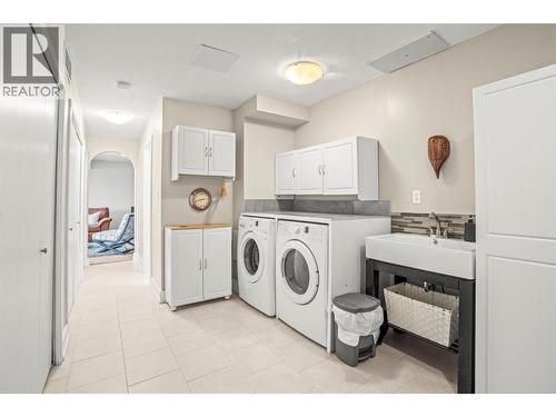Laundry - 8990 College Drive, Coldstream, BC - Indoor Photo Showing Laundry Room