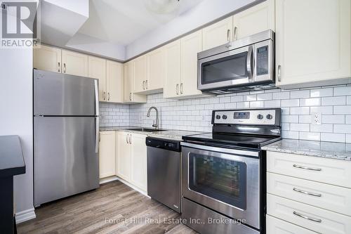 108 - 2 Anchorage Crescent, Collingwood, ON - Indoor Photo Showing Kitchen With Stainless Steel Kitchen With Upgraded Kitchen