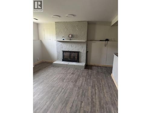 231 Centennial Drive, Mackenzie, BC - Indoor Photo Showing Living Room With Fireplace
