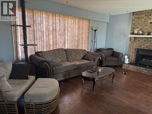 231 Centennial Drive, Mackenzie, BC - Indoor Photo Showing Living Room With Fireplace