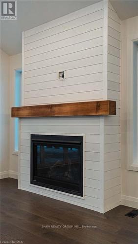 31 Glen Eagle Court, Huntsville, ON - Indoor Photo Showing Living Room With Fireplace