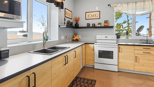 137 Eagle Point, Osoyoos, BC - Indoor Photo Showing Kitchen With Double Sink