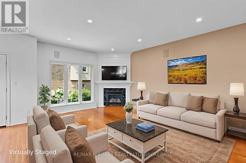 Great room with gas fireplace - 23 Goring Way, Niagara-On-The-Lake (St. Davids), ON - Indoor Photo Showing Living Room With Fireplace