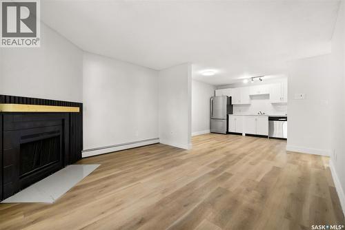 510 2406 Heseltine Road, Regina, SK - Indoor With Fireplace