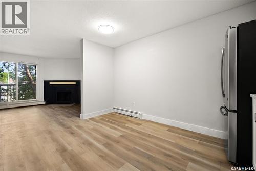 510 2406 Heseltine Road, Regina, SK - Indoor With Fireplace