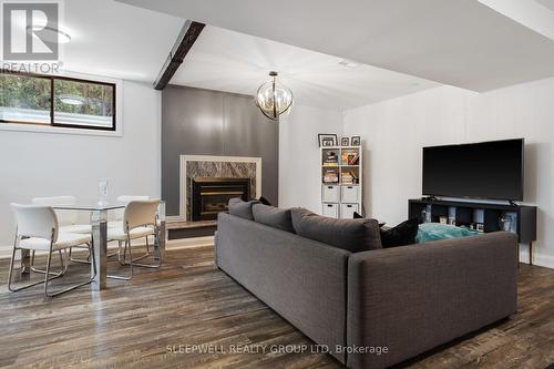 1545 Prince Of Wales Drive, Ottawa, ON - Indoor Photo Showing Living Room With Fireplace