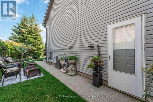 Side of yard with entrance to garage - 6295 Townline Road, West Lincoln (Smithville), ON - Outdoor With Exterior