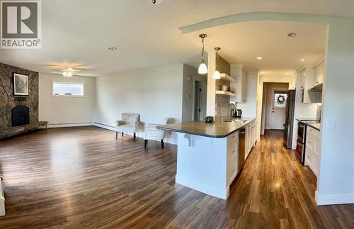 4340 Beach Avenue Unit# 106, Peachland, BC - Indoor Photo Showing Other Room With Fireplace