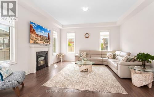 77 Pond View Gate, Hamilton, ON - Indoor Photo Showing Living Room With Fireplace