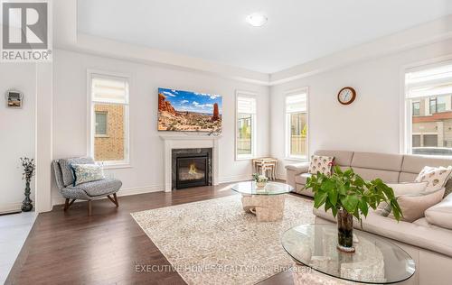 77 Pond View Gate, Hamilton, ON - Indoor Photo Showing Living Room With Fireplace