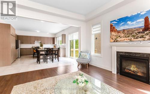 77 Pond View Gate, Hamilton, ON - Indoor Photo Showing Living Room With Fireplace