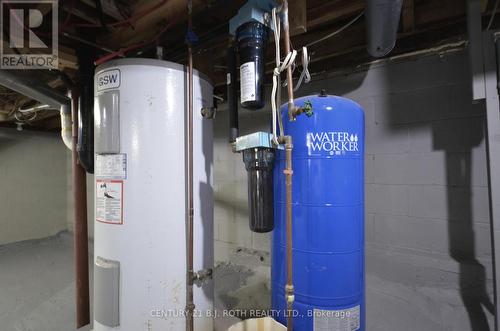 Ulilities - Hot Water Tank & Well Pressure Tank - 45 Lionel Road, West Nipissing, ON - Indoor Photo Showing Basement