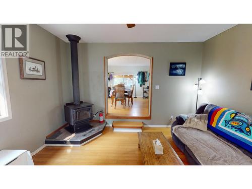 713 Tibbles Road, Quesnel, BC - Indoor Photo Showing Living Room With Fireplace