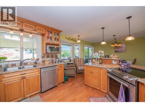 8841 Michael Drive, Coldstream, BC - Indoor Photo Showing Kitchen With Double Sink