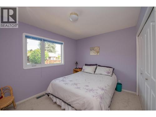 8841 Michael Drive, Coldstream, BC - Indoor Photo Showing Bedroom