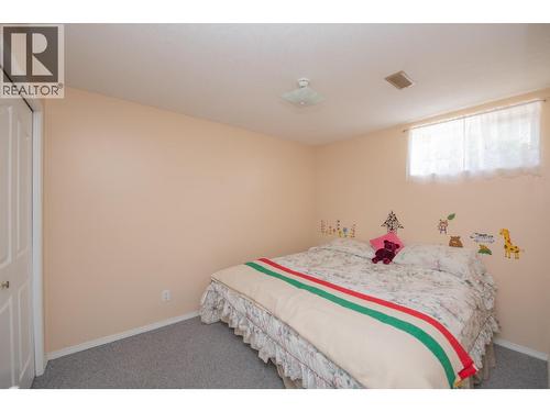 8841 Michael Drive, Coldstream, BC - Indoor Photo Showing Bedroom