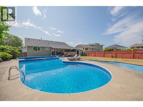 8841 Michael Drive, Coldstream, BC - Outdoor With In Ground Pool With Backyard