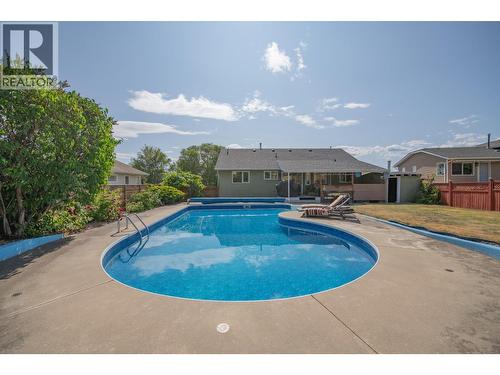 8841 Michael Drive, Coldstream, BC - Outdoor With In Ground Pool With Backyard