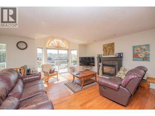 8841 Michael Drive, Coldstream, BC - Indoor Photo Showing Living Room With Fireplace