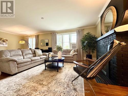 18 Joseph Street, Kawartha Lakes (Bobcaygeon), ON - Indoor Photo Showing Living Room With Fireplace