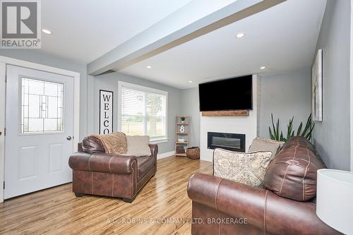 42770 3 Highway, Wainfleet (Marshville/Winger), ON - Indoor Photo Showing Living Room With Fireplace
