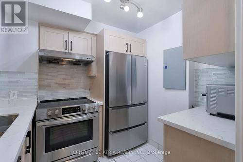 710 - 8 Lee Centre Drive, Toronto, ON - Indoor Photo Showing Kitchen