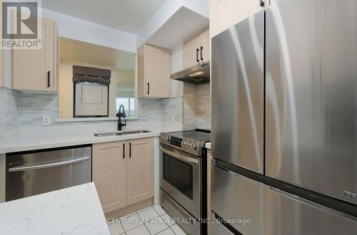 710 - 8 Lee Centre Drive, Toronto, ON - Indoor Photo Showing Kitchen With Double Sink With Upgraded Kitchen