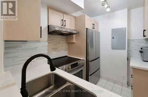 710 - 8 Lee Centre Drive, Toronto, ON - Indoor Photo Showing Kitchen With Double Sink