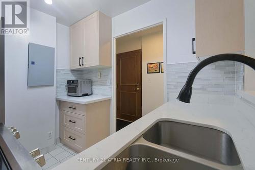 710 - 8 Lee Centre Drive, Toronto, ON - Indoor Photo Showing Kitchen With Double Sink