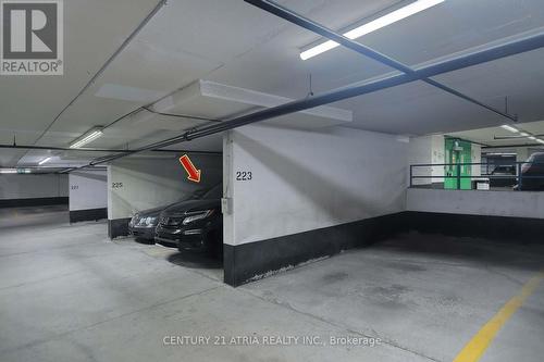 710 - 8 Lee Centre Drive, Toronto, ON - Indoor Photo Showing Garage