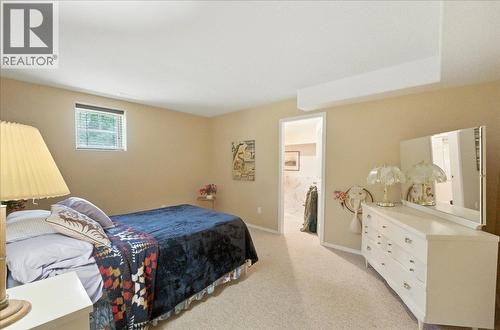 7761 Devito Drive, Trail, BC - Indoor Photo Showing Bedroom