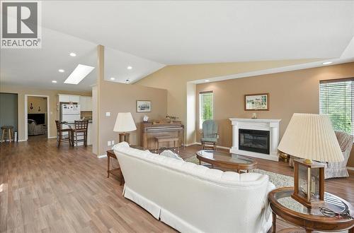 7761 Devito Drive, Trail, BC - Indoor Photo Showing Living Room With Fireplace