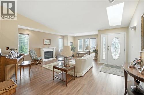 7761 Devito Drive, Trail, BC - Indoor Photo Showing Living Room With Fireplace