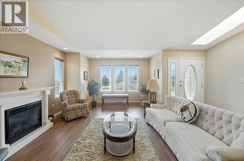 7761 Devito Drive, Trail, BC - Indoor Photo Showing Living Room With Fireplace