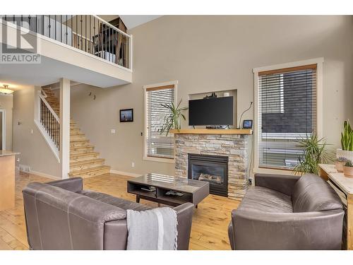 6930 Barcelona Drive E Unit# 47, Fintry, BC - Indoor Photo Showing Living Room With Fireplace