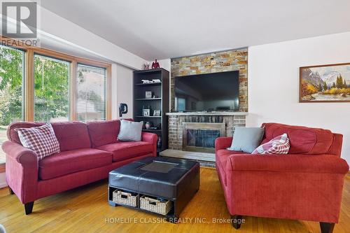 67 Beaver Bend Crescent, Toronto, ON - Indoor Photo Showing Living Room With Fireplace
