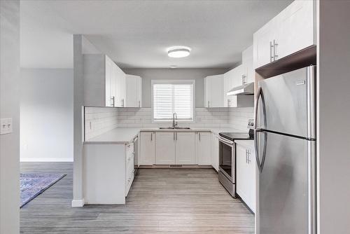 1375 Orchard Drive, Kelowna, BC - Indoor Photo Showing Kitchen With Double Sink