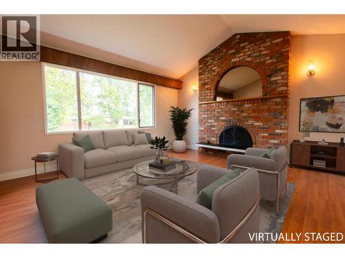 2438 Mcbride Crescent, Prince George, BC - Indoor Photo Showing Living Room With Fireplace