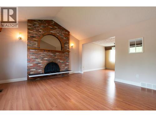 2438 Mcbride Crescent, Prince George, BC - Indoor Photo Showing Living Room With Fireplace