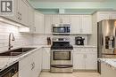 Quality Chef's Kitchen - 151 Taylor Road Unit# 202, Kelowna, BC  - Indoor Photo Showing Kitchen With Double Sink With Upgraded Kitchen 