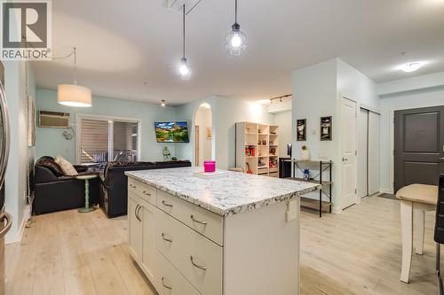 Convenient island - 151 Taylor Road Unit# 202, Kelowna, BC - Indoor Photo Showing Kitchen