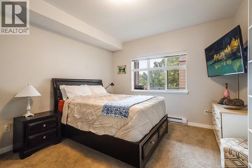 Primary Bedroom - 151 Taylor Road Unit# 202, Kelowna, BC - Indoor Photo Showing Bedroom