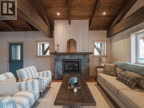 23 Birchgrove Bend, Kaslo, BC - Indoor Photo Showing Living Room With Fireplace