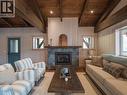 23 Birchgrove Bend, Kaslo, BC  - Indoor Photo Showing Living Room With Fireplace 