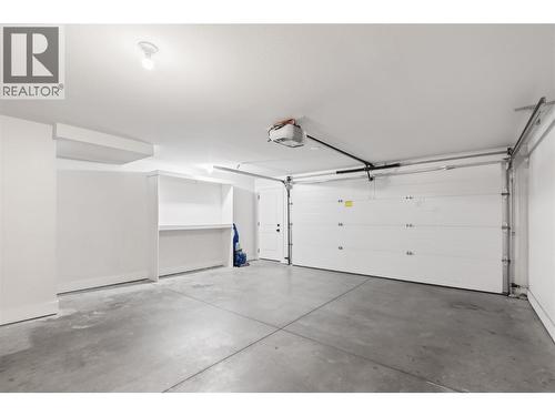 644 Lequime Road Unit# 4, Kelowna, BC - Indoor Photo Showing Garage